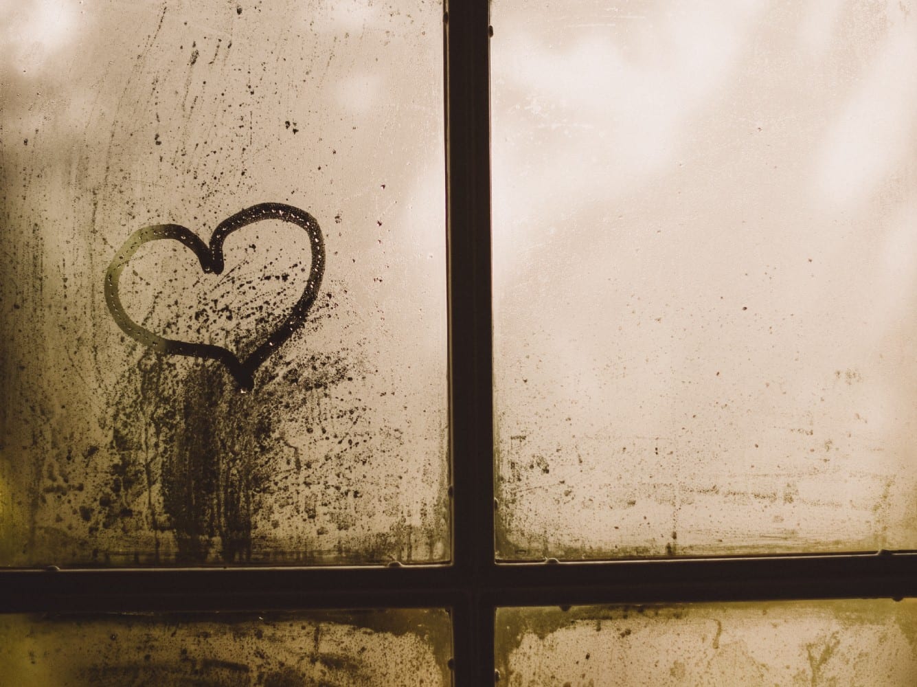 heart drawn on a foggy window